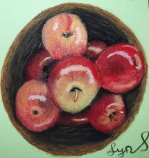 Apples in a basket by Lyn